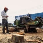 A stump grinder in action demonstrates the best way to remove a tree stump.